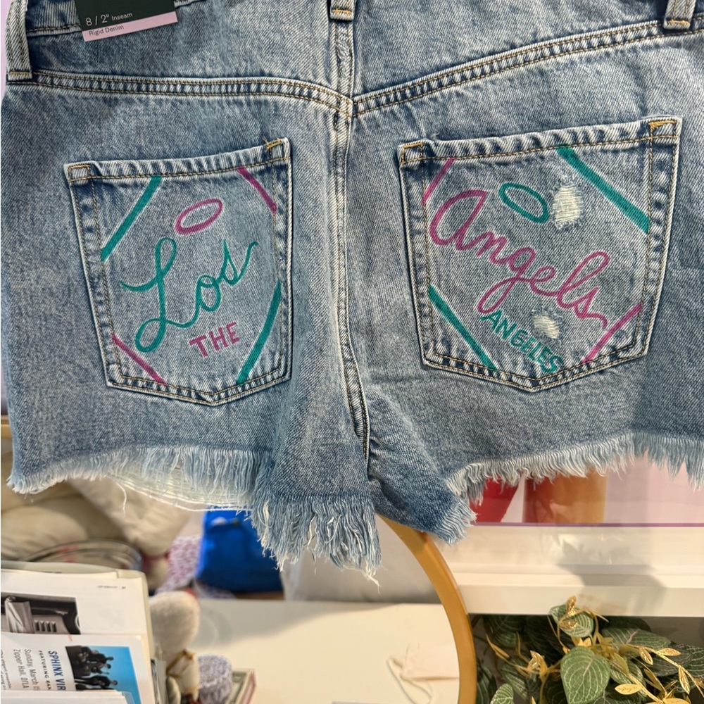 One of a Kind Jean Shorts w/ Hand-painted designs by artist - Picture 4 of 9